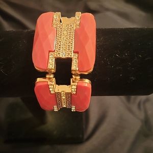 Park Lane bright pink, rose gold with white stones.